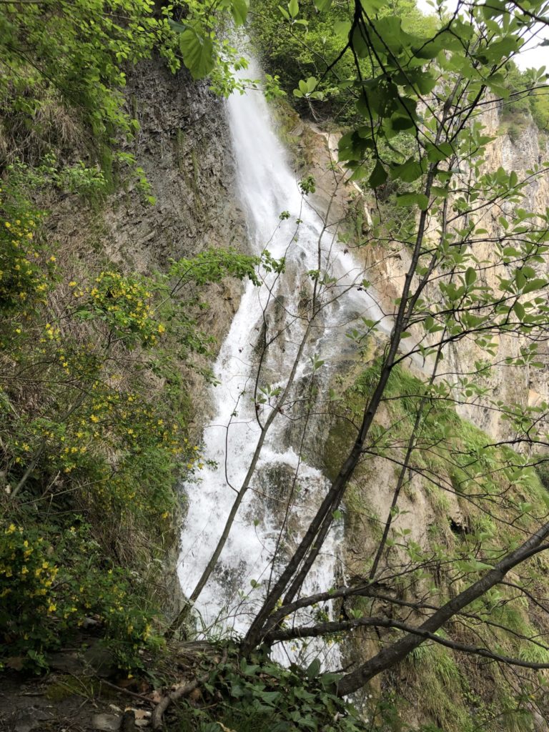 A large volume of water filling the waterfall