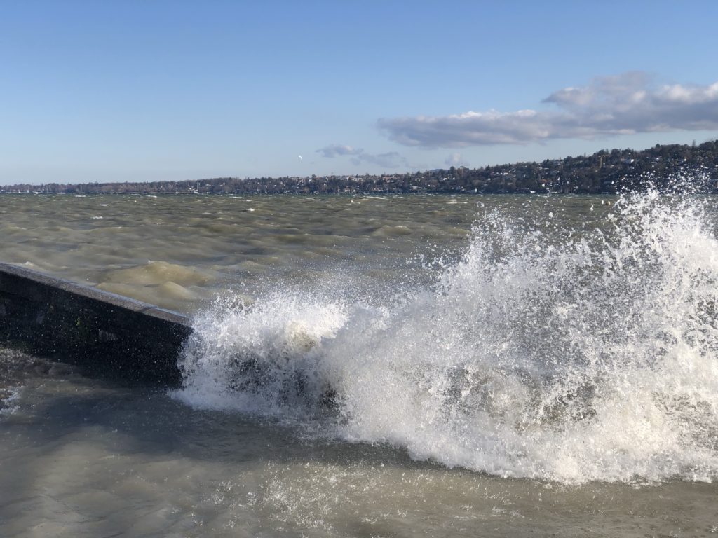 A wave splashing over the wall