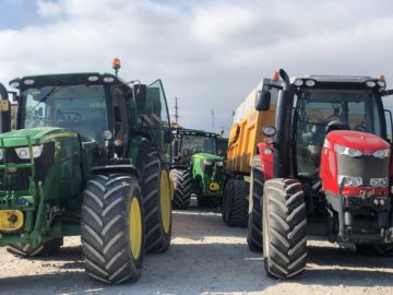 A Queue of Tractors Without Drivers