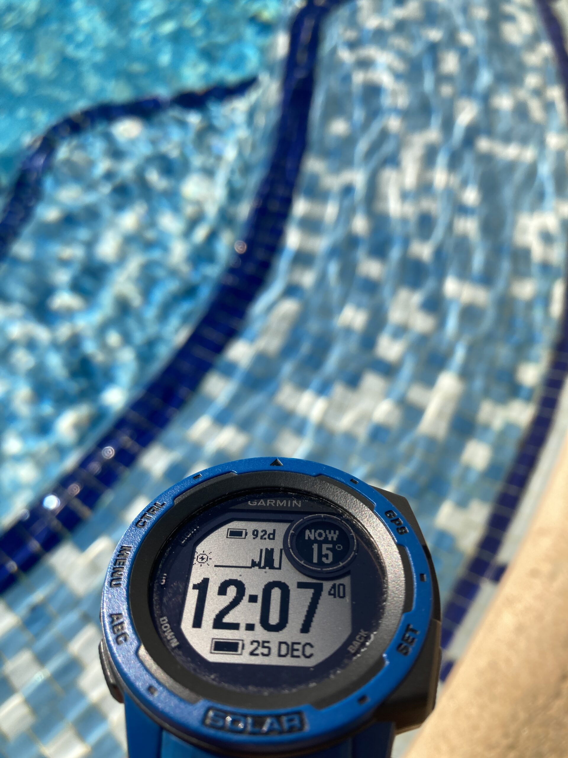 Garmin Instinct with a tiled pool