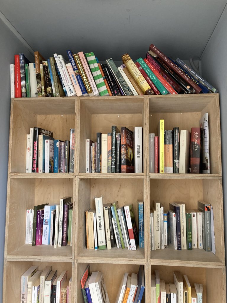 Books in an old phone booth